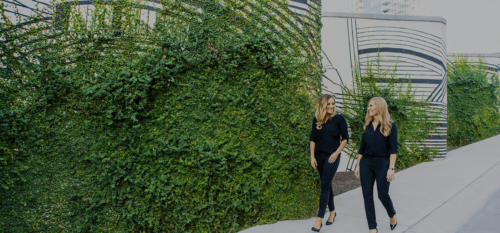 Dr. Kimberley Barclay, D.M.D. and Dr. Lauren Jacobson D.M.D. walking and talking about their brand new downtown Austin, TX dentistry where they offer the greatest dental experience clients could ask for.