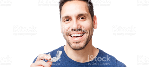 Stock image of a guy smiling with a white mouthguard.