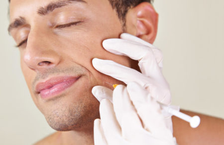 Man receiving Jaw Botox injection
