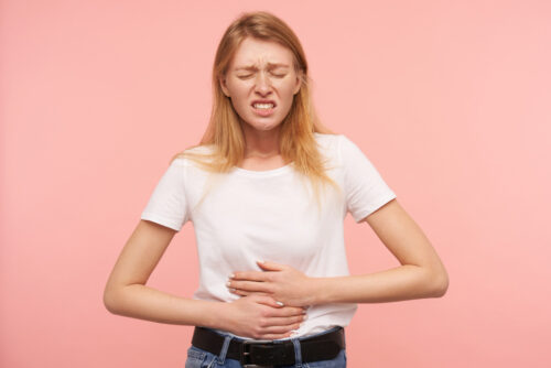 girl suffering from acid reflux